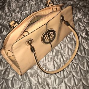 Big enough for all your accessories many pockets.